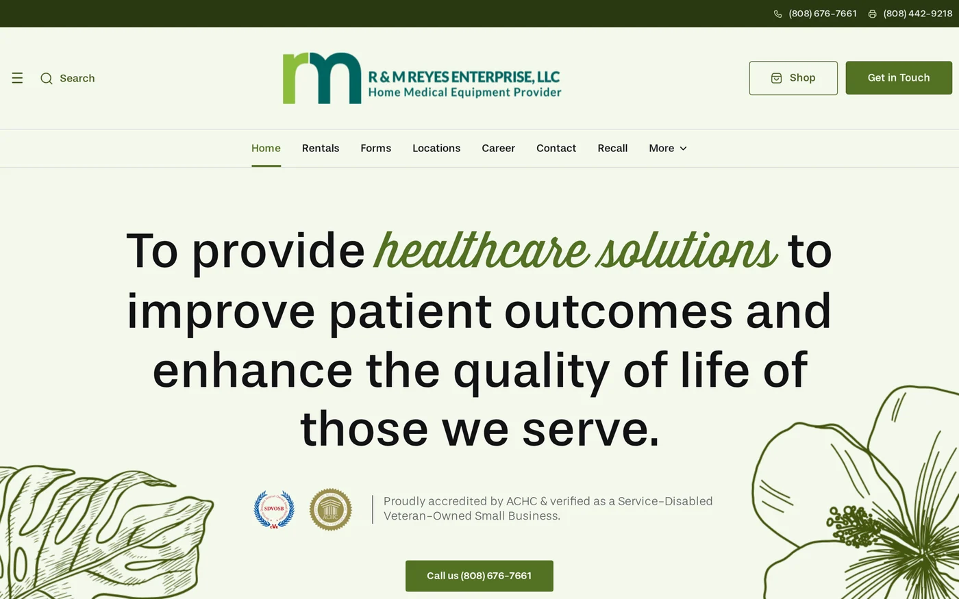 RNM Reyes website, with green typography and botanical details